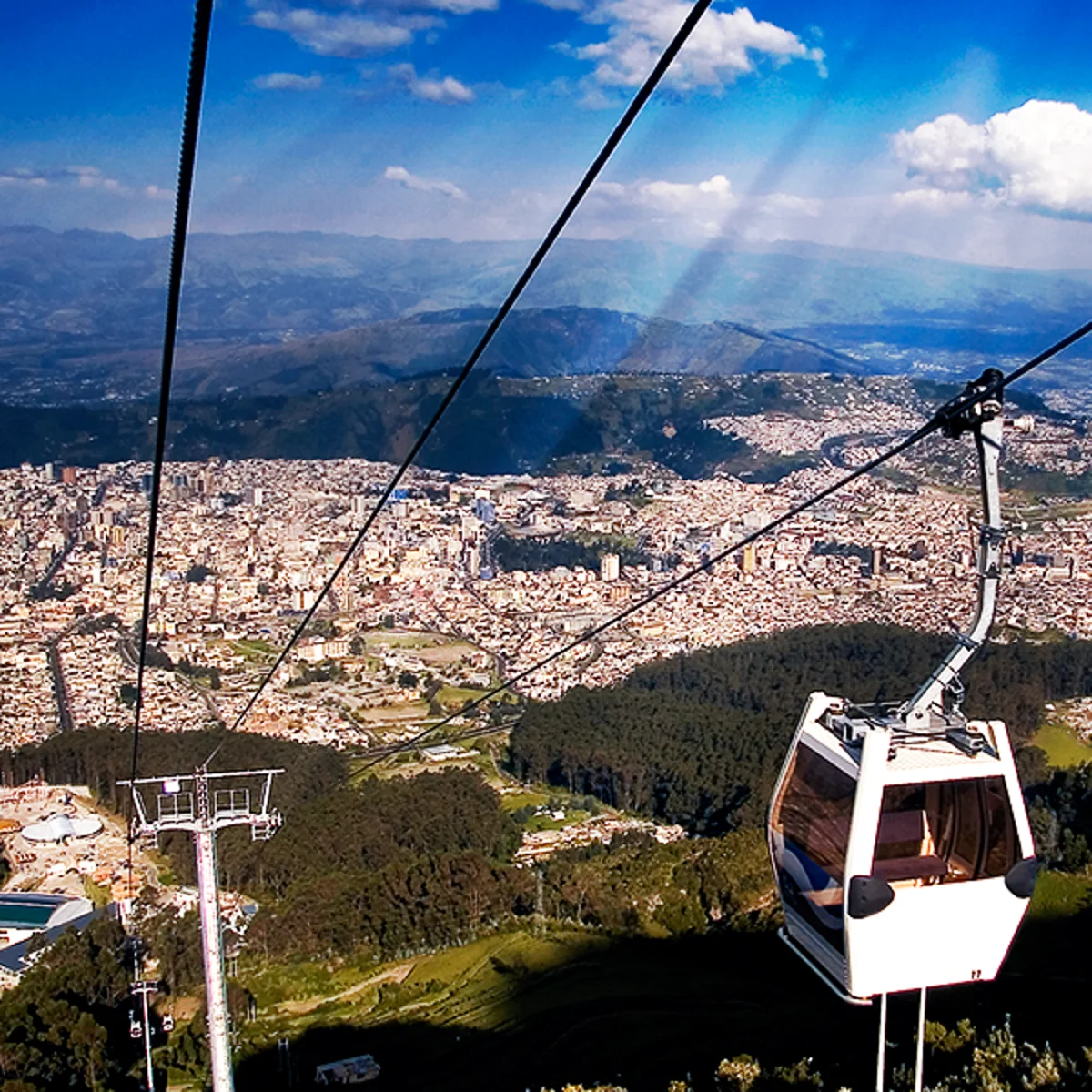 Quito TelefériQo cable car overlooking the city and surrounding Andean mountains in Ecuador.
